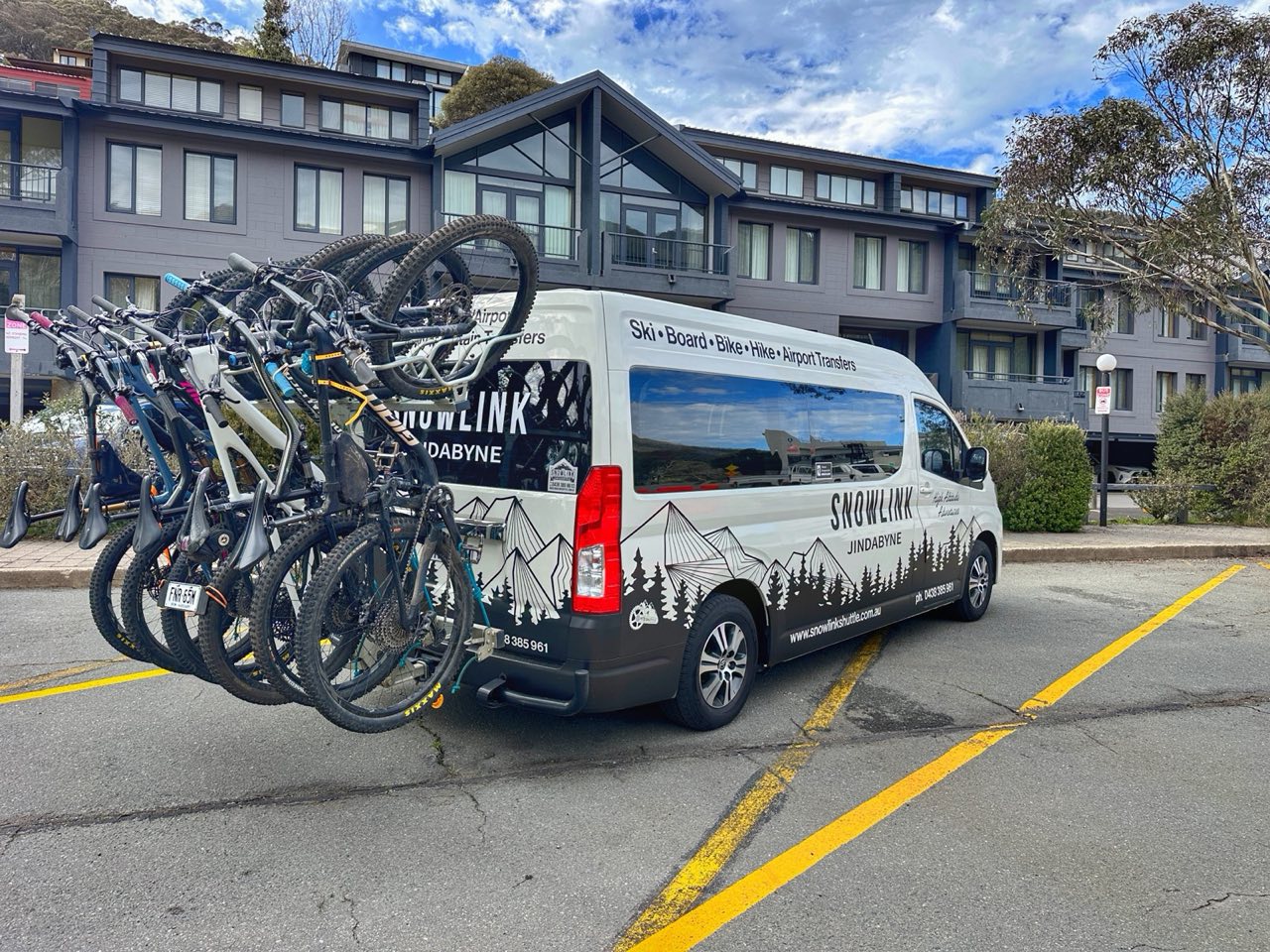 Six mountain bikes on the Snowlink HiAce bike rack