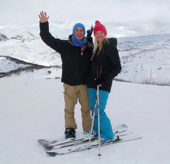 Lars and Leanne, owners of Snowlink, on skis in the Snowy Mountains